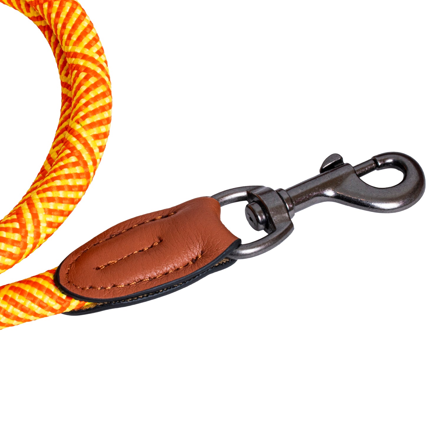 Dog leash with yellow and orange pattern, brown leather patch, and metal clip on a white background